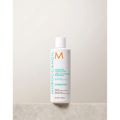 Moroccanoil Hydrating Conditioner bottle for daily moisture and smoothing, enriched with argan oil and vitamins A and E.