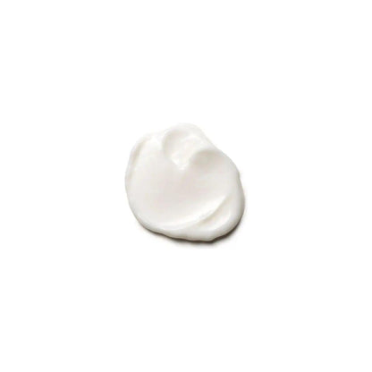 A smooth, creamy dollop of Moroccanoil® Hydrating Conditioner on a white background, ideal for nourishing dry hair.