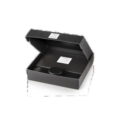 Open black box packaging for Fuoco Plus electrostimulator and sculpting cream kit.