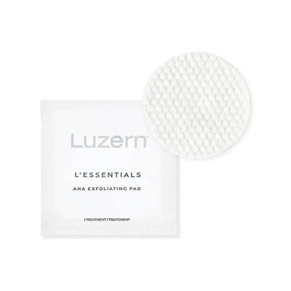 Luzern L'Essentials AHA Exfoliating Pads packaging and pad, designed for gentle skin exfoliation and radiance improvement.