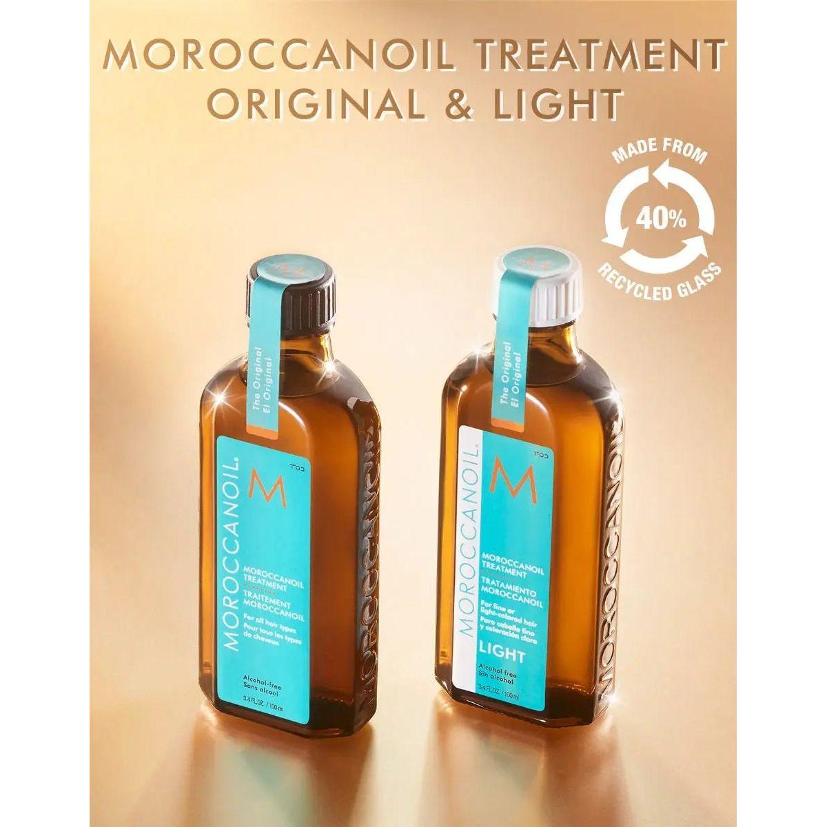 Moroccanoil treatment bottles, Original and Light, showcasing lightweight hair oil for frizz control and shine.