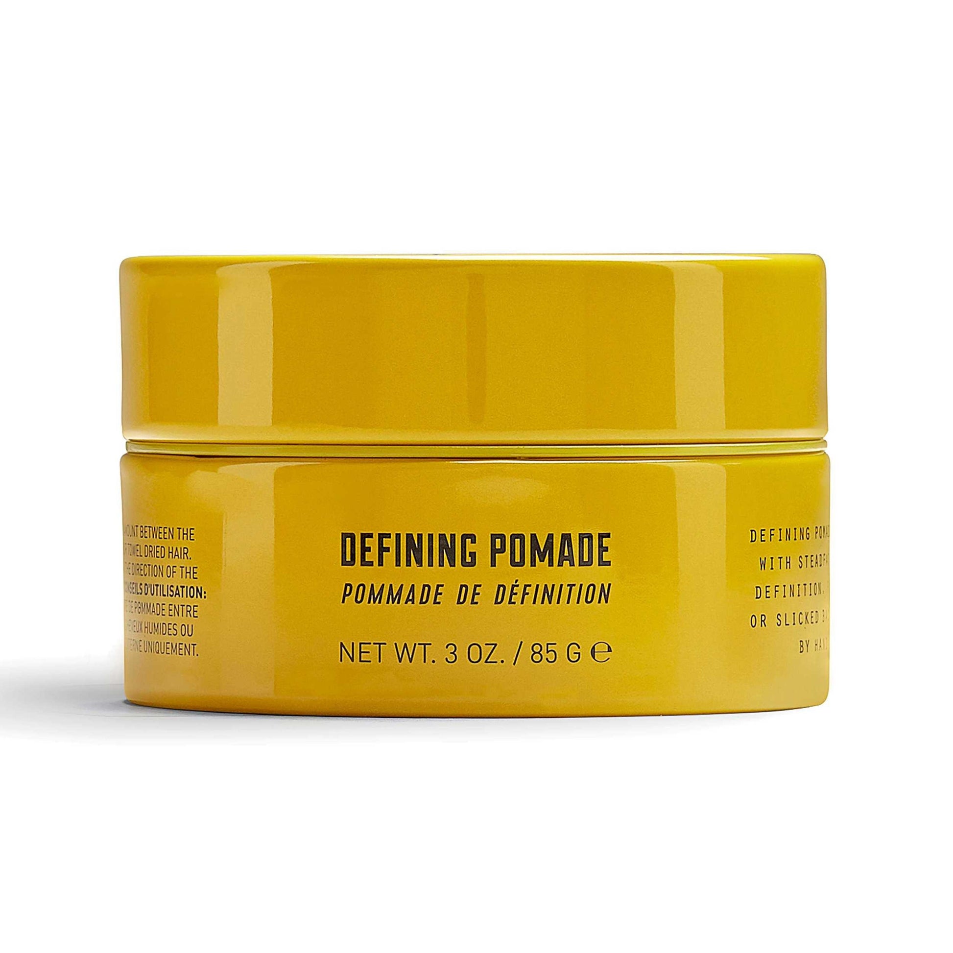 Lock Stock & Barrel Defining Pomade in a yellow jar, 85g, offers high shine and steadfast hold for sleek hairstyles.