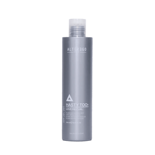 Hasty Too Love Me Curl modeling fluid for natural curl control and soft, defined curls in a sleek gray bottle.