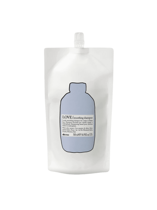 Love Smoothing Shampoo Refill pouch for frizzy hair, infused with olive extract for deep hydration and smoothing effects.