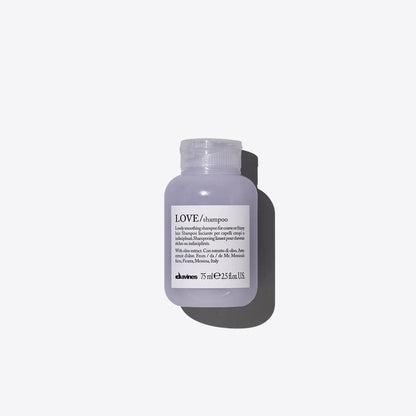Davines LOVE Smoothing Shampoo bottle, designed to control frizz and smooth unruly hair with natural ingredients.