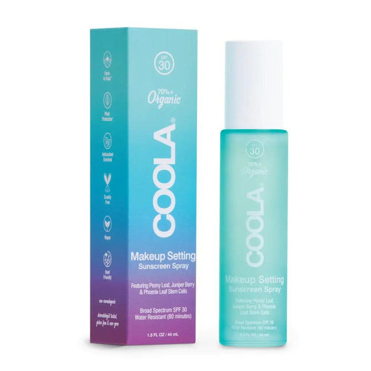 Makeup Setting Spray SPF 30 in a teal bottle, packaged with a colorful box, featuring organic ingredients for hydration and sun protection.