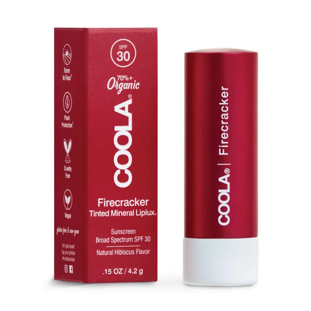 Coola Firecracker Tinted Mineral Liplux SPF 30 lip balm with organic ingredients in red packaging.