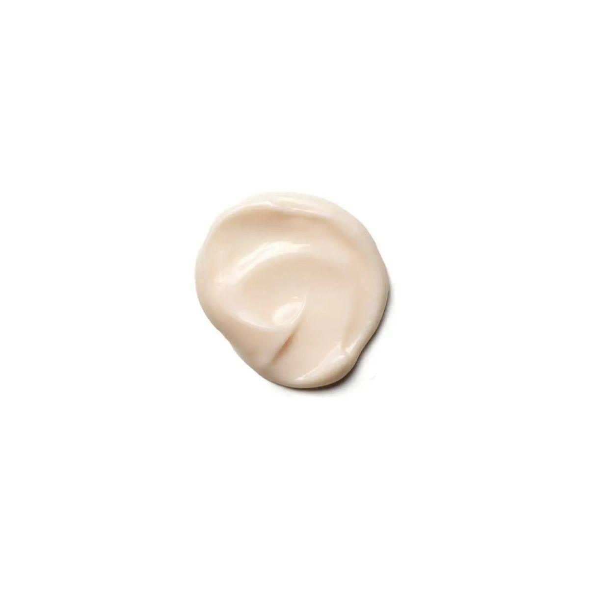 Swirl of creamy Moisture Repair Conditioner, designed to hydrate and restore damaged hair with nourishing ingredients.