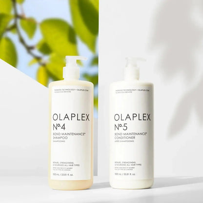 Olaplex Nº.4 Bond Maintenance Shampoo and Nº.5 Conditioner for all hair types, repairing and hydrating color-treated hair.