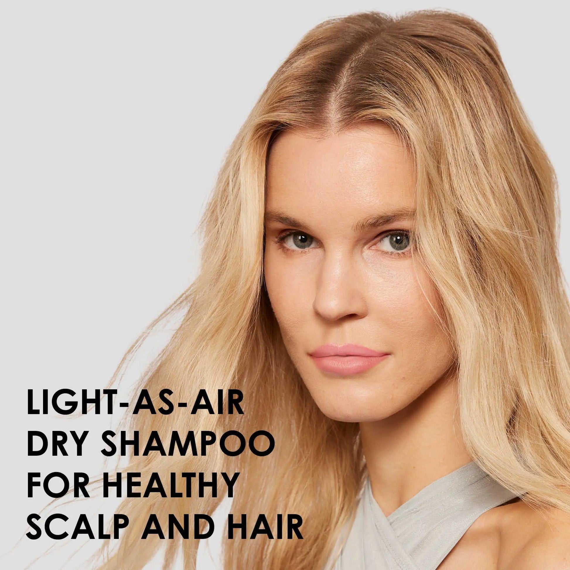 Model showcasing Nº.4D Clean Volume Detox Dry Shampoo for a healthy scalp and voluminous hair.