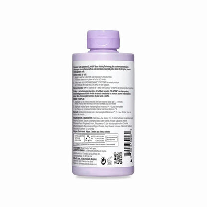 Olaplex Nº.4P Blonde Enhancer Toning Shampoo bottle back view, showcasing product details and ingredients.