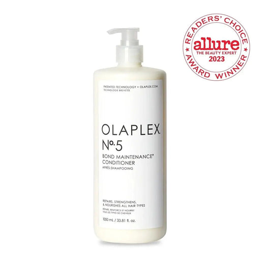 Olaplex Nº.5 Bond Maintenance Conditioner 1000ml bottle, ideal for repairing damaged hair and reducing frizz. Award-winning product.