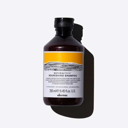 Nourishing shampoo bottle for dehydrated scalp and dry hair, 250 ml, by Davines, featuring a yellow label design.