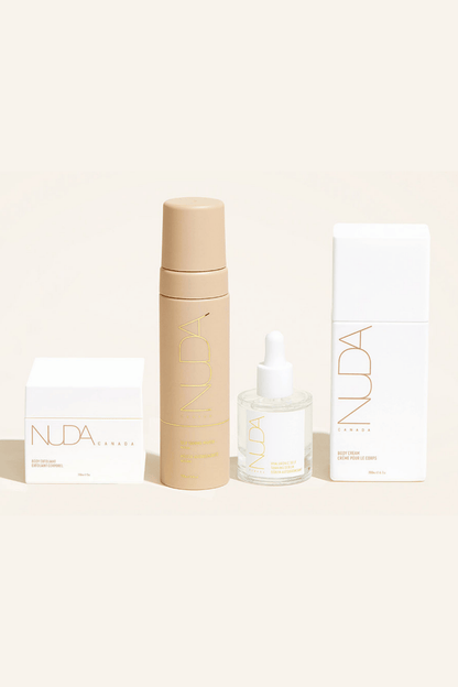 Nuda Routine Kit featuring Self Tanning Mousse, Body Exfoliant, Face Tanner, and Body Cream for a flawless glow.