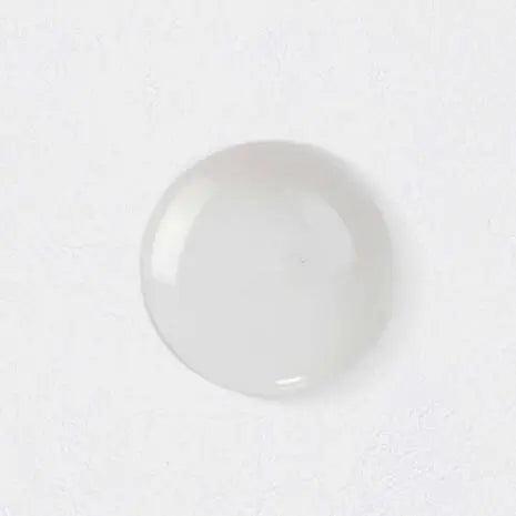 clear gel drop from Kérastase Nutritive Bain Satin 2 refill pouch on a white background