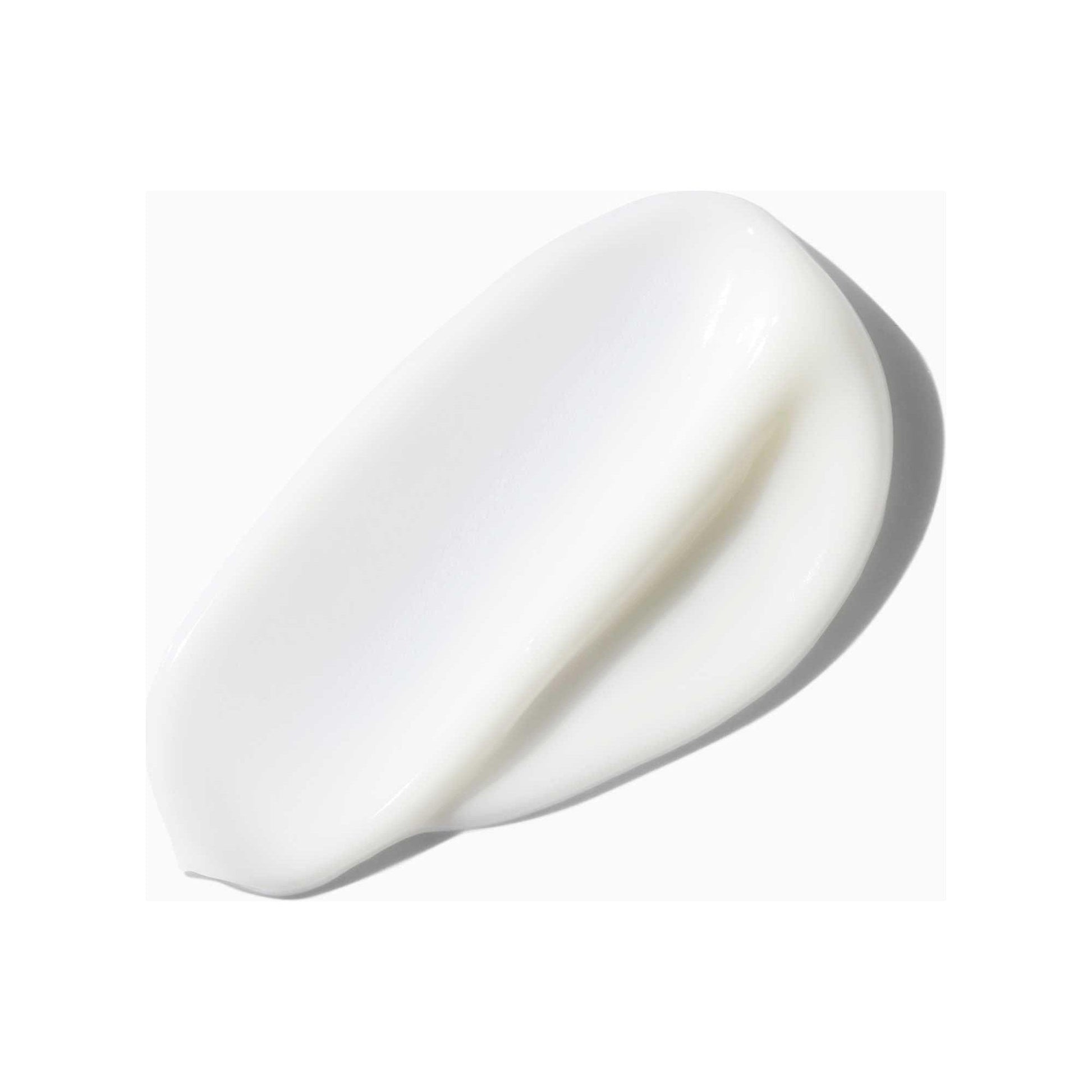 Creamy texture of Kérastase Nutritive Lait Vital Conditioner for ultra-light detangling and nourishment for dry hair.