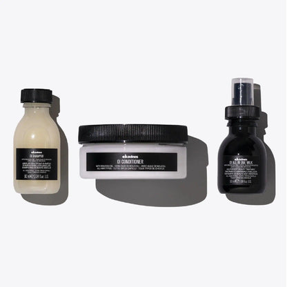OI Travel Set including OI Shampoo, OI Conditioner, and OI All in One Milk for nourishing all hair types.
