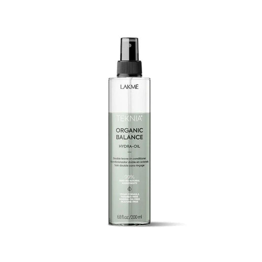 Lakme Organic Balance Hydra-oil spray bottle, designed for nourishing and protecting hair with a refreshing citrus fragrance.