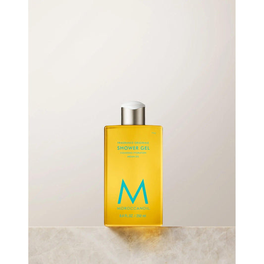 Original Scented Shower Gel bottle with Moroccan oil, showcasing bright yellow packaging and sleek design on a neutral background.