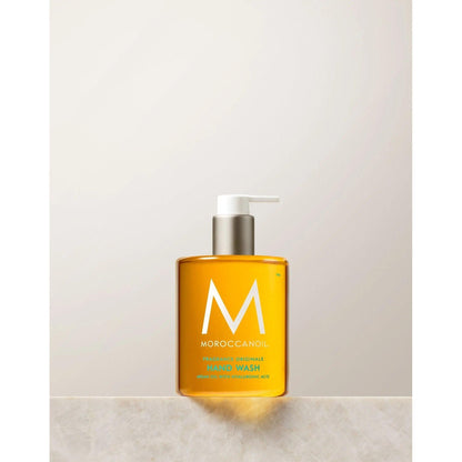 Originale Fragrance Hand Wash in a clear bottle featuring a pump, enriched with argan oil and hyaluronic acid.