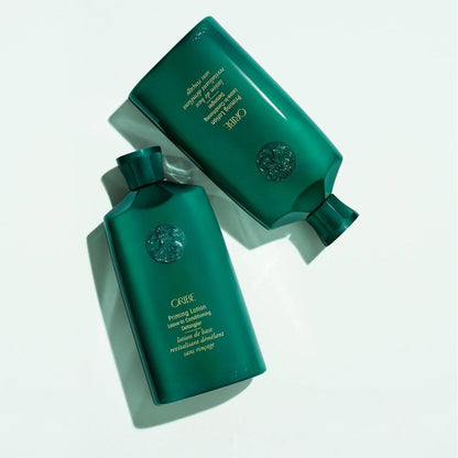 Priming Lotion Leave-In Conditioning Detangler bottles on a light surface, promoting healthy curls and detangling benefits.