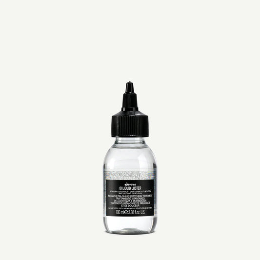 Oi Liquid Luster 100ml bottle, weightless hair treatment enhancing shine and smoothness for all hair types.
