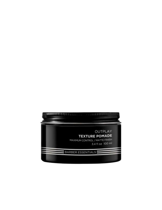 Redken Brews Outplay Texture Pomade jar for men's hairstyles, offering maximum control and matte finish, 100ml.