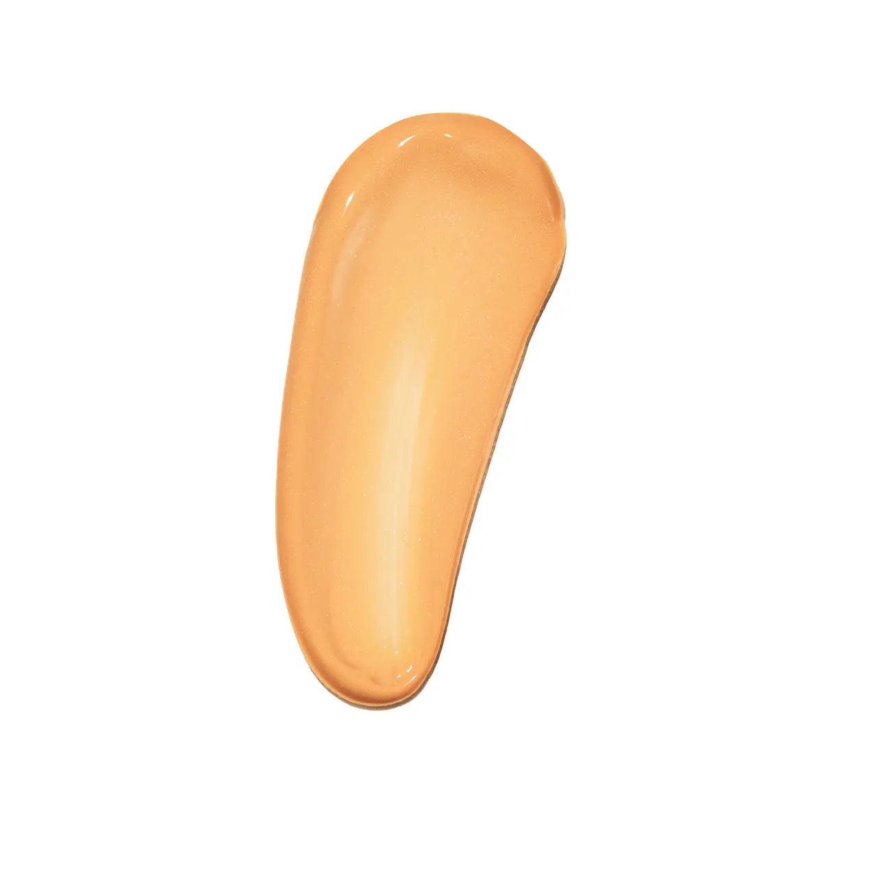 Swatch of Rōsilliance® Tinted Moisturizer Organic Sunscreen SPF 30 in Golden Hour, showcasing its sheer, warm hue.