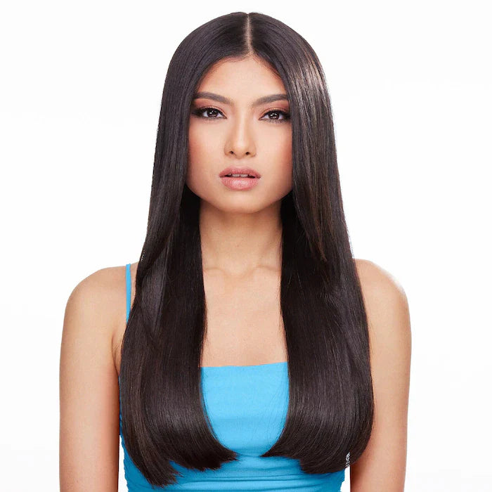 Woman with sleek, glossy straight hair, showcasing a polished look ideal for demonstrating an anti-frizz treatment.