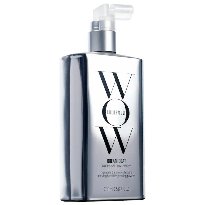 Dream Coat Supernatural Spray bottle for anti-frizz treatment, showcasing sleek design and humidity-blocking technology.