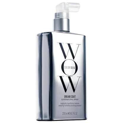Dream Coat Supernatural Spray bottle for anti-frizz treatment, showcasing sleek design and humidity-blocking technology.