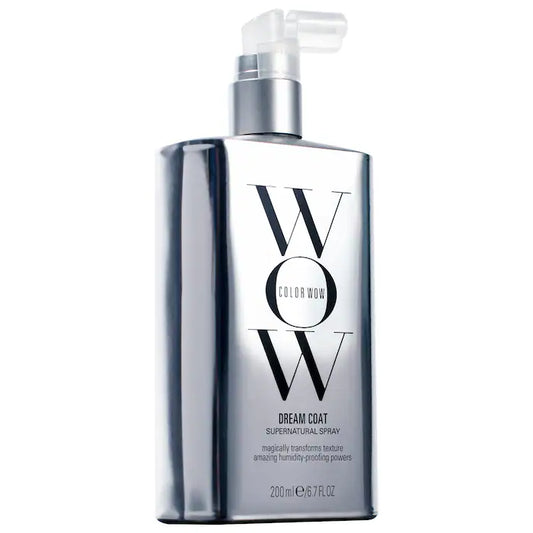 Dream Coat Supernatural Spray bottle for anti-frizz treatment, showcasing sleek design and humidity-blocking technology.