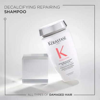 Kérastase Bain Décalcifiant Repairing Shampoo bottle for all types of damaged hair on a sleek background.