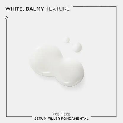 White balmy texture of Kérastase Sérum Filler Fondamental for damaged hair treatment.