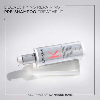 Kérastase decalcifying repairing pre-shampoo treatment for all types of damaged hair in a sleek bottle.