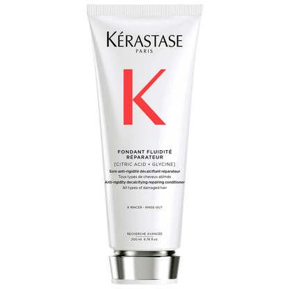 Kérastase Fondant Fluidité Réparateur Conditioner tube for damaged hair with decalcifying properties, 200ml size.