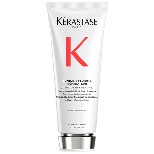 Kérastase Fondant Fluidité Réparateur Conditioner tube for damaged hair with decalcifying properties, 200ml size.