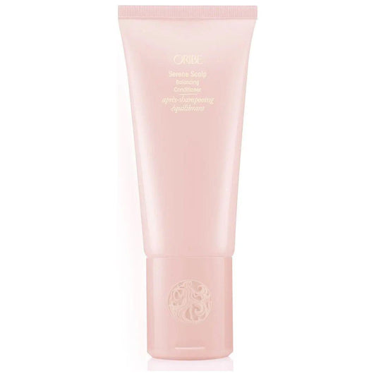 Oribe Serene Scalp Soothing Leave-On Treatment for Sensitive Skin in Pink Bottle