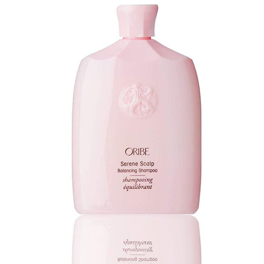 Oribe Serene Scalp Balancing Shampoo bottle in pink packaging for healthy and balanced hair care.