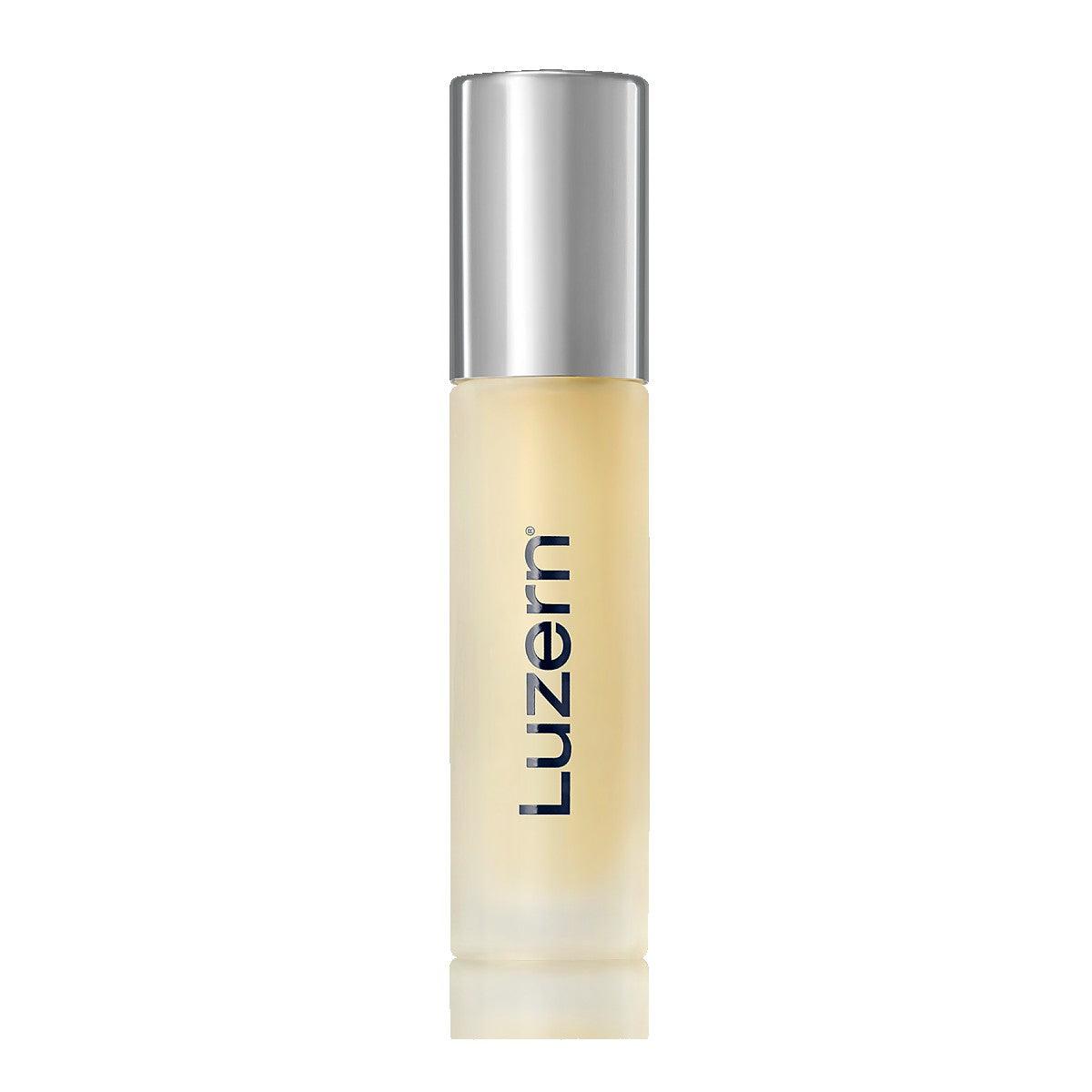 Luzern anti-aging serum in a sleek frosted glass bottle with silver cap.