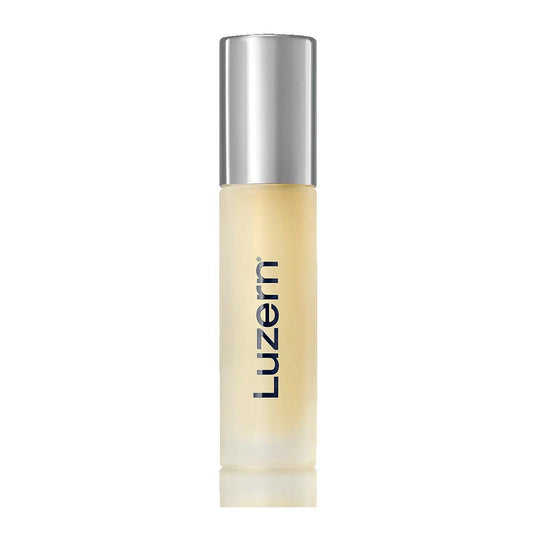 Luzern anti-aging serum in a sleek frosted glass bottle with silver cap.
