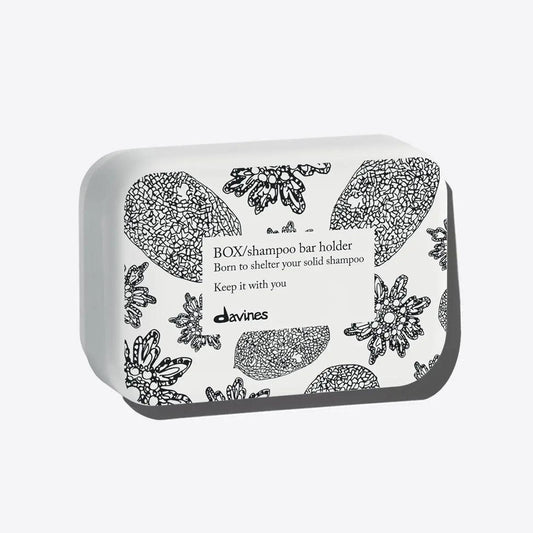 Davines shampoo bar holder case with floral design, ideal for storing and preserving solid shampoo bars.