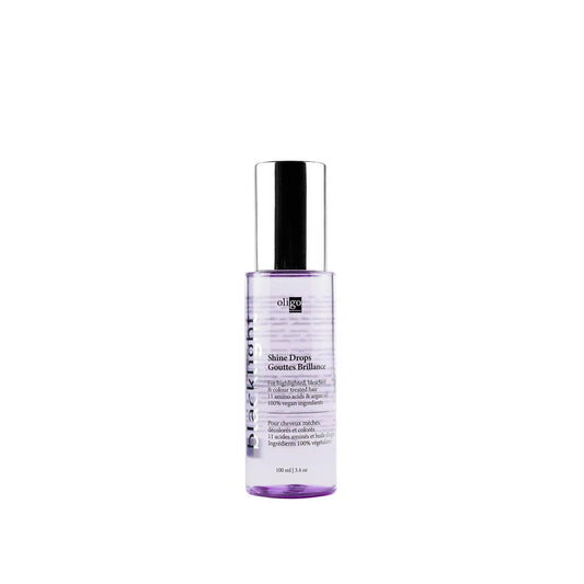 Blacklight Shine Drops oil for highlighted and color-treated hair, providing shine and conditioning in a lightweight formula.