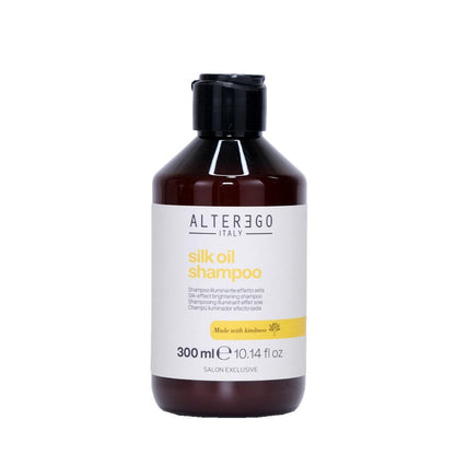 Silk Oil Shampoo bottle for unruly hair, featuring Argan and Coconut oils, free from sulfates and parabens.