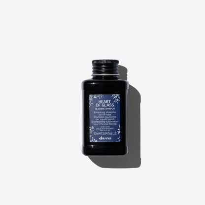Heart of Glass Silkening Shampoo bottle for enhancing and nourishing blonde hair tones.