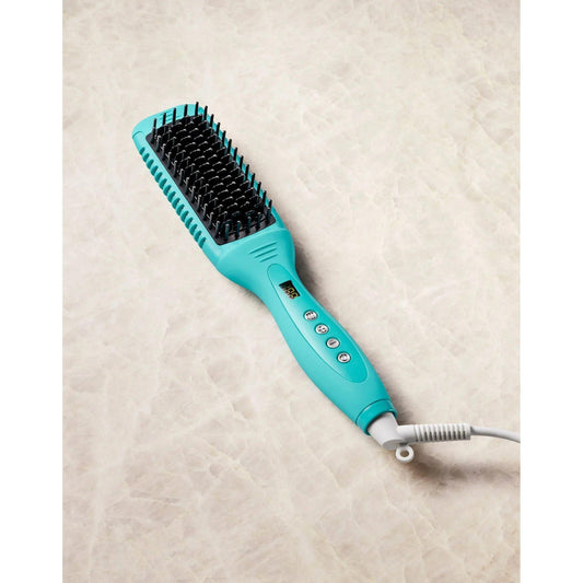 Smooth Style Ceramic Heated Brush in turquoise with digital controls for quick heat styling and frizz-free results.