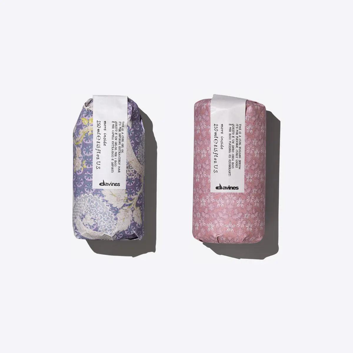 Two beautifully packaged curl building serum and gel oil from Davines, designed for defining natural curls.