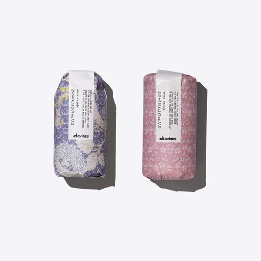 Two beautifully packaged curl building serum and gel oil from Davines, designed for defining natural curls.