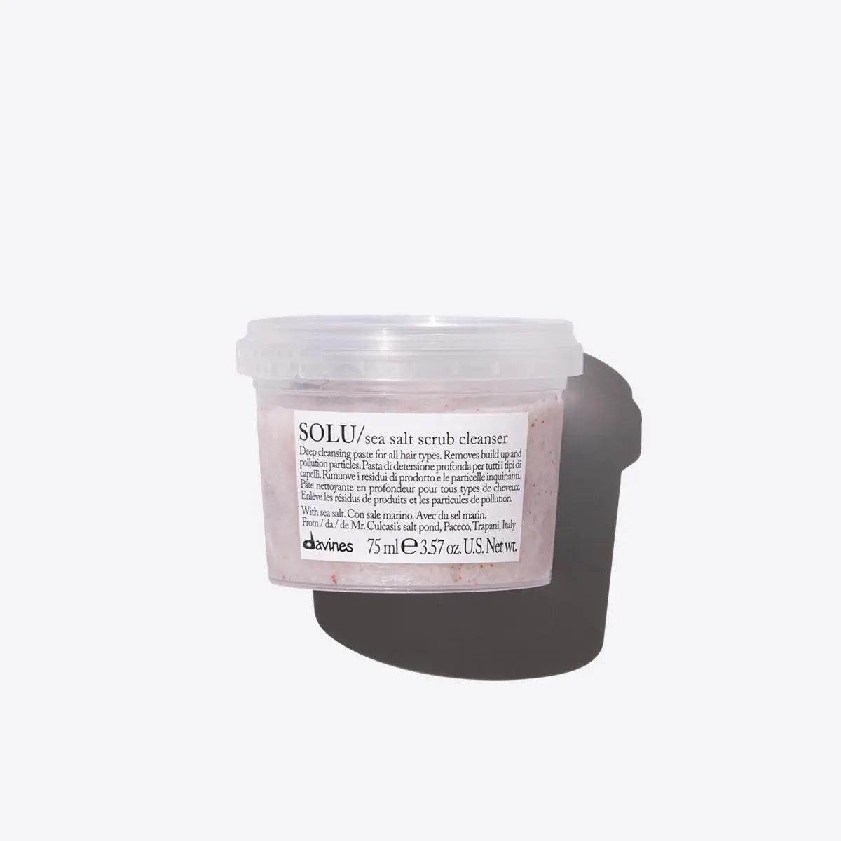 Davines SOLU Sea Salt Scrub Cleanser, deep cleansing hair treatment in a transparent container, 75ml.