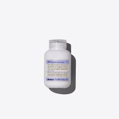 Davines SU Hair and Body Wash bottle with white background